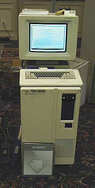 a tower computer with video display and keyboard