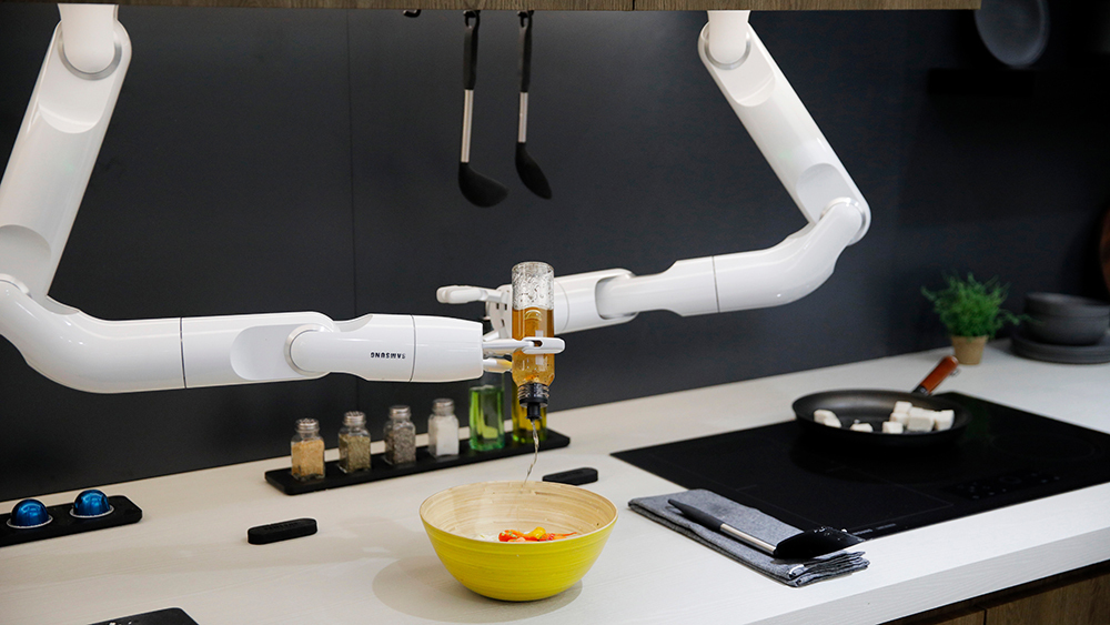 two robot arms hanging down from above